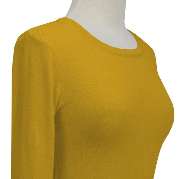fitted pullover sweater in a slightly cropped length with crew neck and 3/4 sleeves in honey mustard yellow, shown close-up on dress form