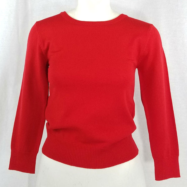 tomato red fitted pullover sweater in a slightly cropped length with crew neck and 3/4 sleeves, shown on mannequin