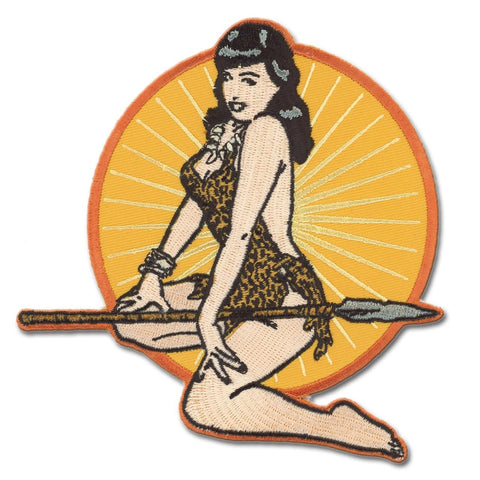Queen of Pinups, Bettie Page in her iconic leopard print costume with spear on orange circle background, illustrated on a 5" x 5" embroidered patch