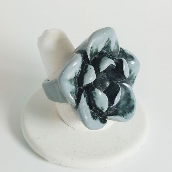 1.5" grey flower plastic ring with rich black shadowing