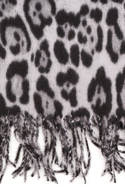 72" x 27" grey and black leopard print 100% polyester scarf with fringe, shown cropped close up