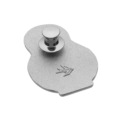 An enamel pin with a silver metal locking pin back