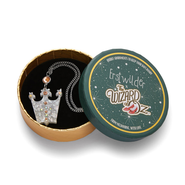 Wizard of Oz Collection "The Good Witch's Crown" layered resin pendant necklace with Czech glass crystals, shown in illustrated round box packaging