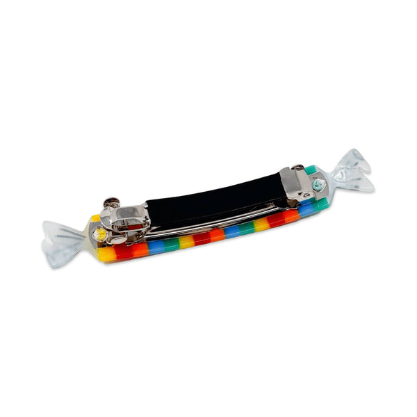 cellulose acetate multicolored stripe hair clip in the shape of a roll of smarties candy with cellophane style ends. Shown from back to display french barrette backing