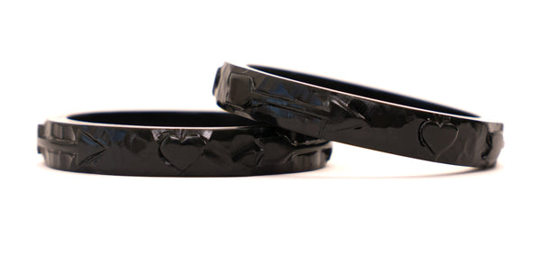 black resin spacer bangle with hand carved heart and arrow motif