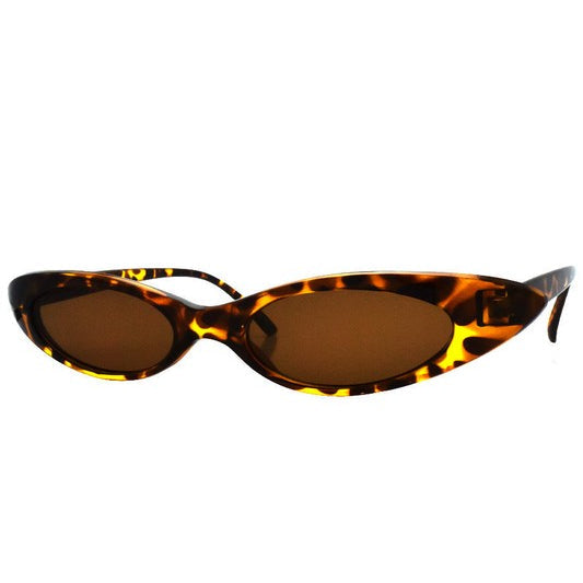 skinny dark tortoiseshell cat-eye sunglasses with brown smoke lenses shown from side
