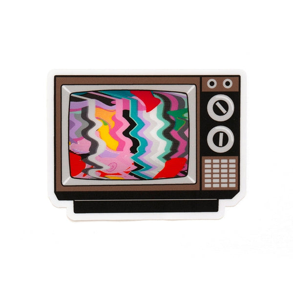 Die-cut vinyl sticker of a black and brown old fashioned tv with antenna and a multicolored scrambled image with visible nipple on its screen