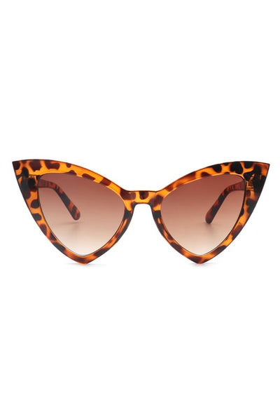 angular cat-eye plastic frame sunglasses in a translucent tortoiseshell pattern with gradient brown lens