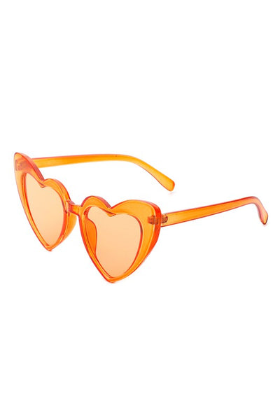angular cat eye "Lolita" heart-shaped sunglasses in a bright translucent orange with orange lens, shown 3/4 view