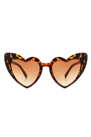 angular cat eye "Lolita" heart-shaped sunglasses in a translucent tortoiseshell pattern with brown gradient lens