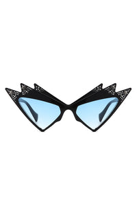 A pair of shiny black ultra geometric cat eye sunglasses with three points at the top of each eye and stamped in mock rhinestones, silver stars, and blue gradient lenses