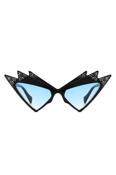A pair of shiny black ultra geometric cat eye sunglasses with three points at the top of each eye and stamped in mock rhinestones, silver stars, and blue gradient lenses