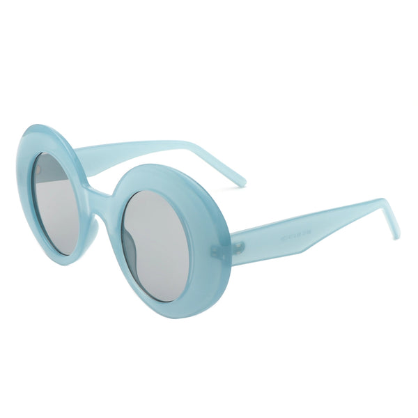 pair of cartoony semi-translucent retro round sunglasses with thick frames in a dusty robin’s egg blue and vertical oval shaped dark smoke lenses, shown 3/4 view