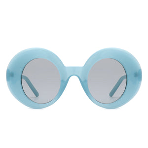 pair of cartoony semi-translucent retro round sunglasses with thick frames in a dusty robin’s egg blue and vertical oval shaped dark smoke lenses