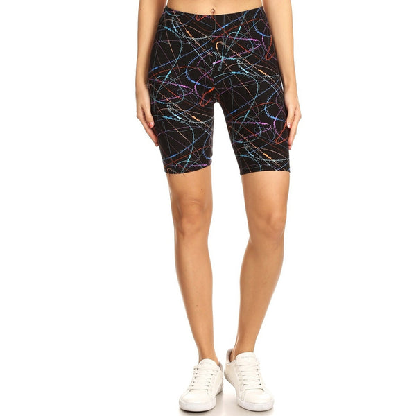 black background neon red, orange, blue, and purple paint splatter print high-waisted bike shorts with elastic waist band, shown waist down on model