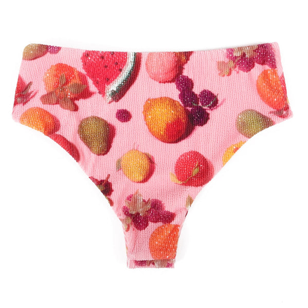 ribbed texture spandex swim bottoms in light pink background photorealistic beaded faux fruit pattern. Shown from back
