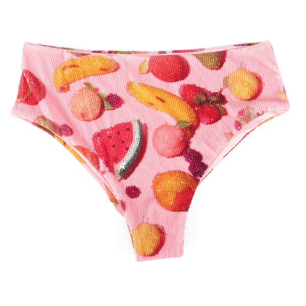 ribbed texture spandex swim bottoms in light pink background photorealistic beaded faux fruit pattern. Shown from front