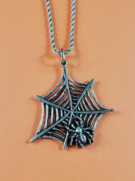 Large American pewter charm of a spiderweb with attached spider. Hanging from a stainless steel rope chain