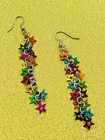 dangle earrings made of multicolor metal star charms on a silver chain 