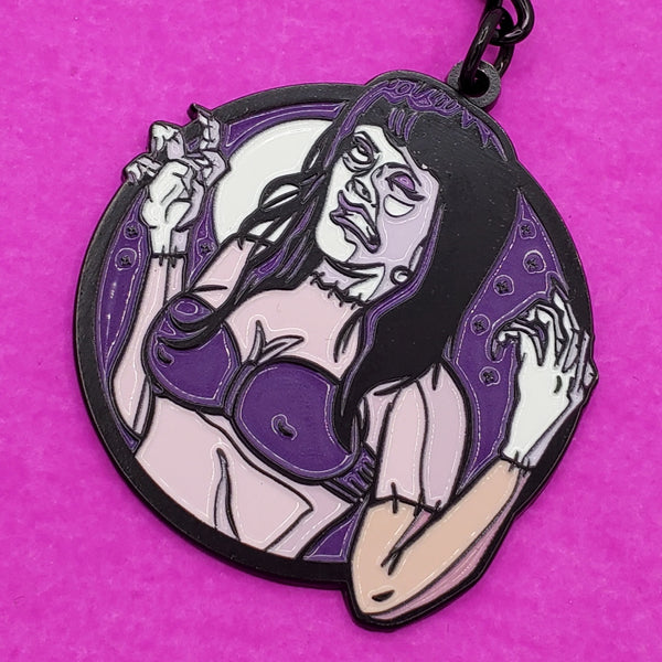 enameled black metal keychain of Elizabeth Shelley from the movie Frankenhooker