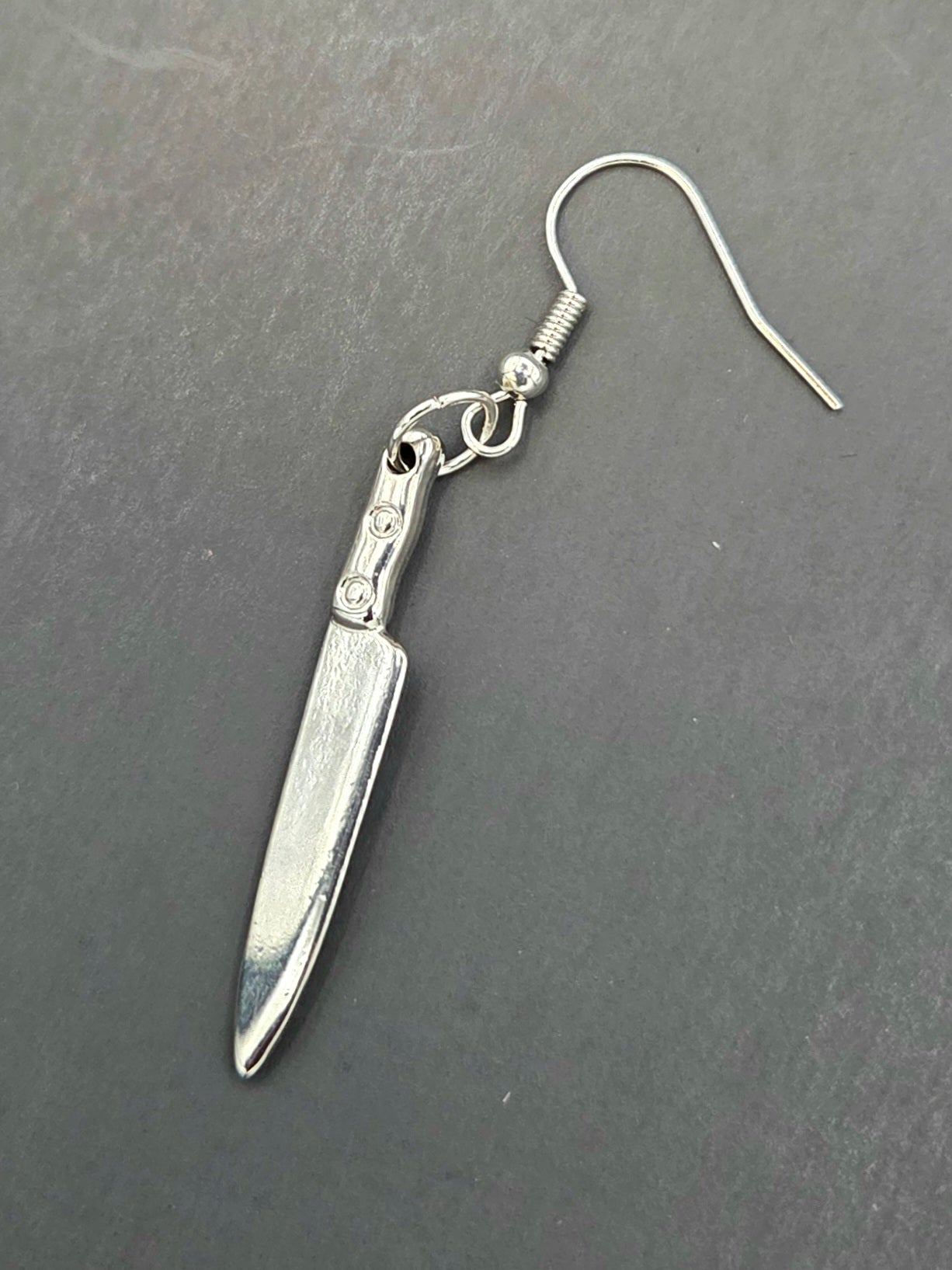 single silver metal kitchen knife shaped dangle earring