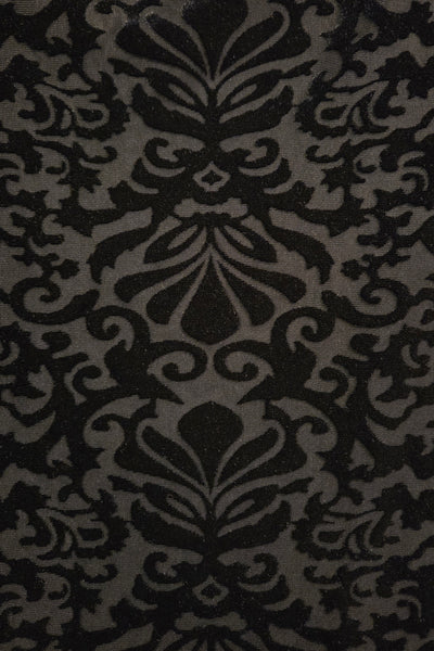 close up of black burnout velvet damask pattern fabric