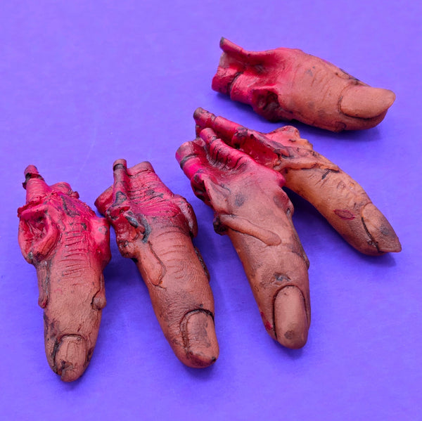 Set of five rubber severed fingers painted to look dirty and bloody
