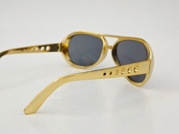 shiny metallic gold plastic aviator sunglasses with perforated gold metal arms and smoke lens