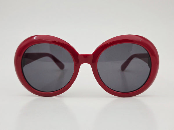 sturdy beveled plastic frame sunglasses in red with wide arms and black smoke lenses