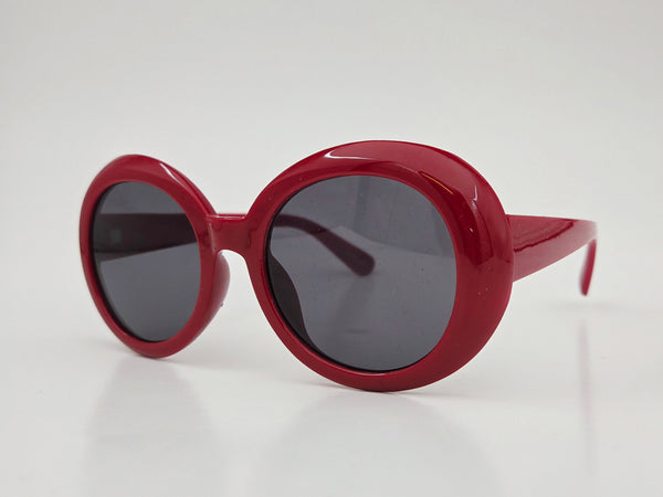 sturdy beveled plastic frame sunglasses in red with wide arms and black smoke lenses