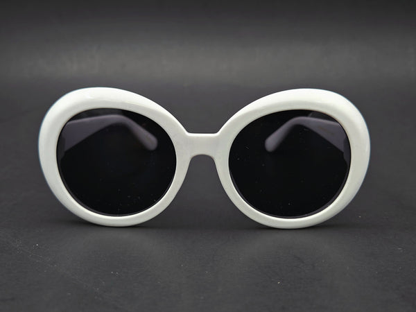 sturdy beveled plastic frame sunglasses in bright white with wide arms and black smoke lenses