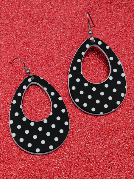 black acrylic teardrop shaped dangle earrings with white polka dots
