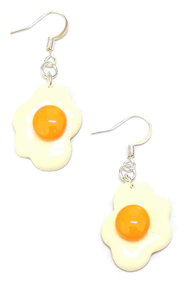 A pair of acrylic fried egg dangle earrings