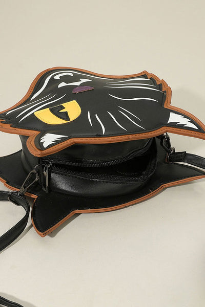 winking black cat-shaped cross-body purse. 