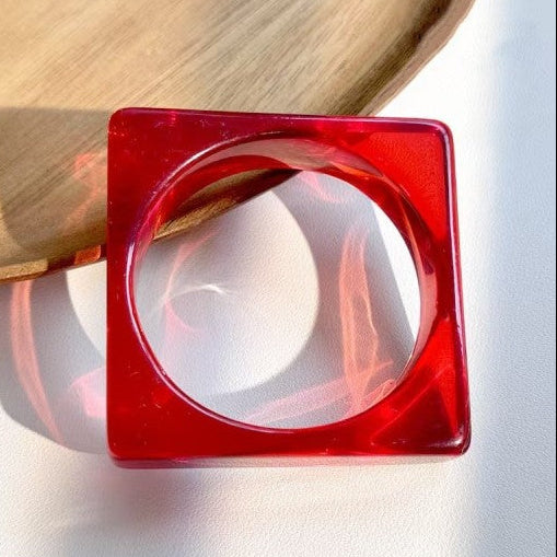 shiny square translucent bright red bangle
