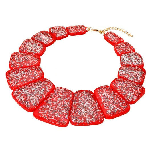 bib necklace made of segments of flat red resin rounded trapezoid shapes with iridescent bar glitter