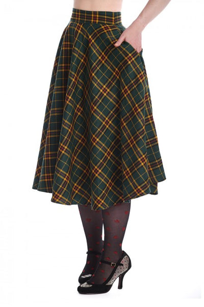 forest green, mustard, red, and black "Highland" plaid 50s style swing skirt, shown waist down 3/4 view on model