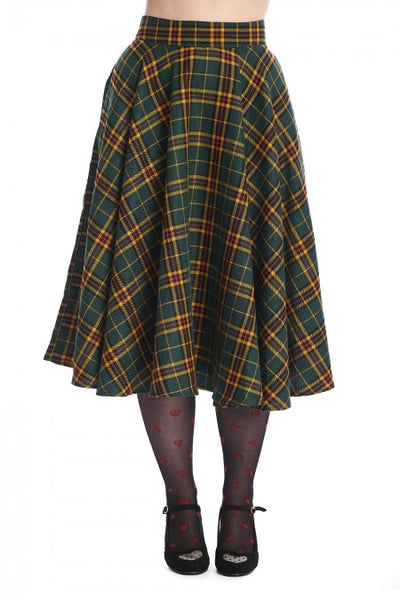 forest green, mustard, red, and black "Highland" plaid 50s style swing skirt, shown waist down on model