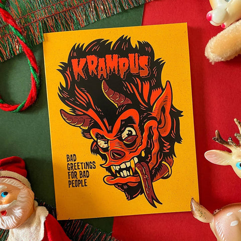 yellow greeting card with image of Krampus in the style of Cramps album "Bad Music for Bad People" and message "Bad Greetings for Bad People" in red and black