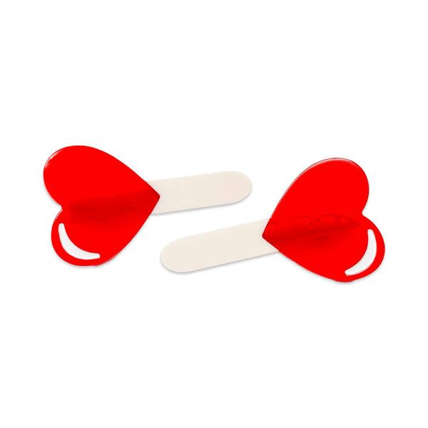 cellulose acetate hair clips in the shape of semi translucent red heart-shaped lollipops with sticks