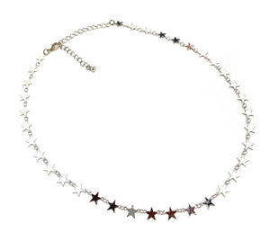 delicate silver metal star charms forming a 13" chain necklace