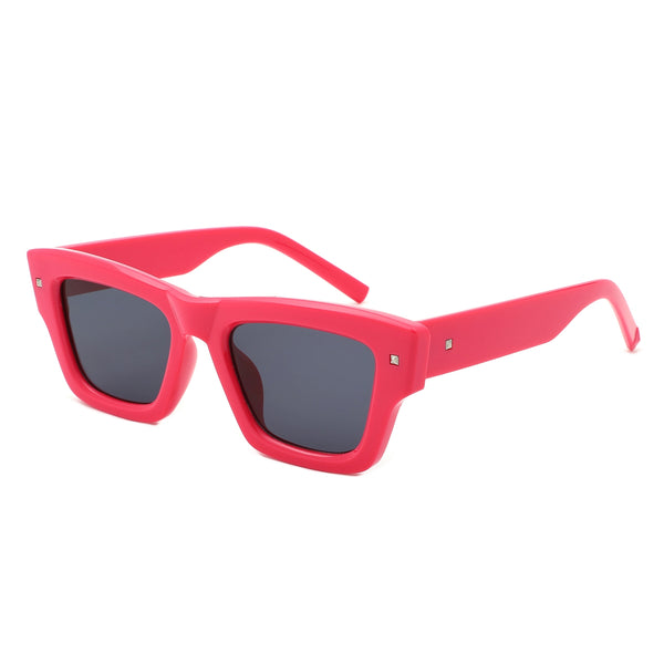 thick framed deep pink wayfarer style sunglasses with silver square stud detail at each temple and arm with black smoke lenses. Shown from side