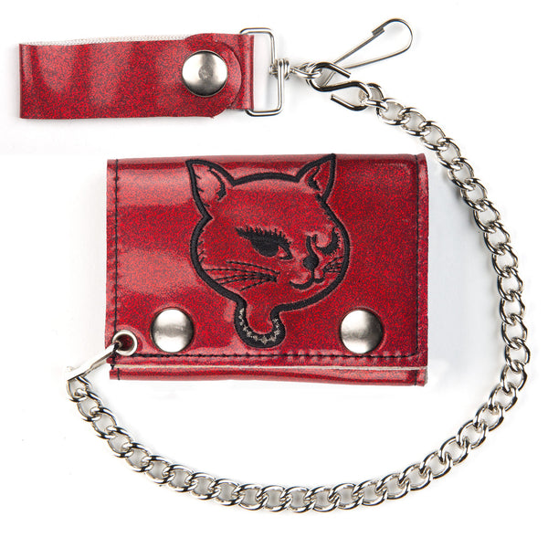 tri-fold snap closure wallet in soft and durable red glitter vinyl with black and silver winking kitty head embroidery and detachable 12" heavy duty silver metal chain. Shown closed