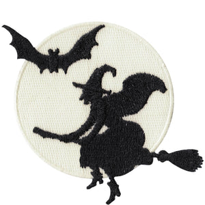 Embroidered patch of a glow in the dark full moon with a large black lurex bat and witch flying on a broom in front 