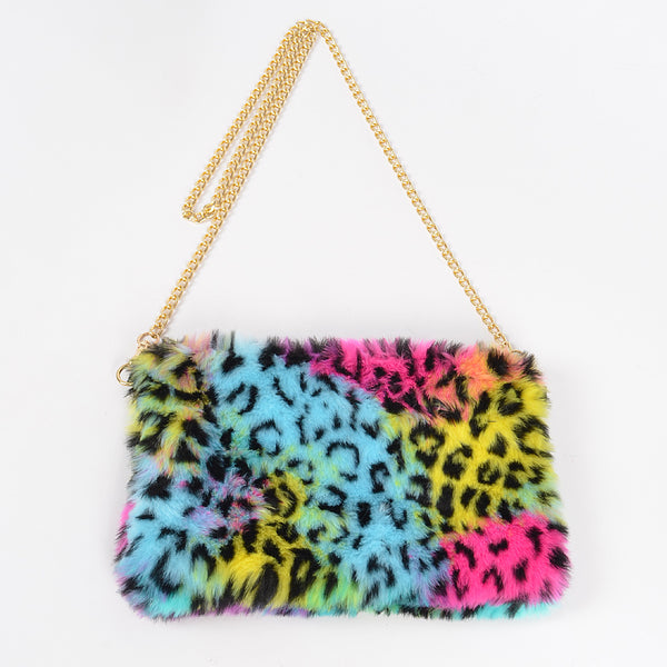 rainbow leopard print faux fur fanny pack purse with top zipper closure, gold curb chain shoulder strap, and black faux leather hand strap. Shown flat with shoulder strap only