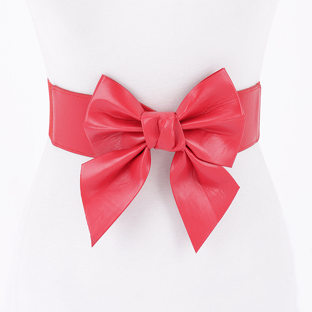 bright red faux leather waist belt with large asymmetrical bow