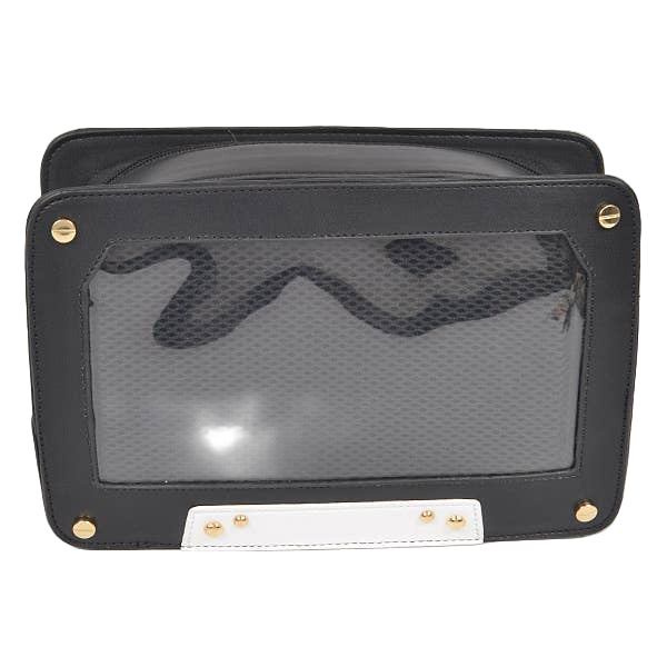 Cassette tape-shaped handbag with red, purple, and black design and gold hardware on a white background. Shown from back to display pin display window