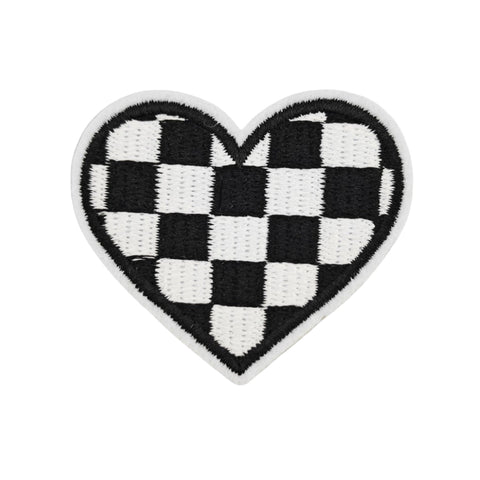 Heart-shaped black and white checkered patch on a white background