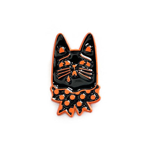 shiny black enamel pin of a sad crying black cat wearing an orange polka dot bow tie