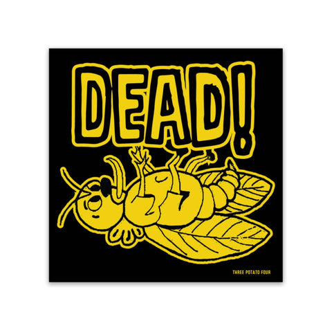 square vinyl sticker with matte finish and black background yellow illustration of a dead bug lying on its back with tongue sticking out and message "DEAD!" in matching yellow lettering